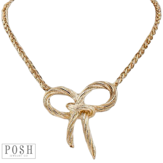 Large infinity bow on wheat chain necklace