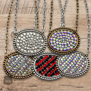 Rhinestone filled oval necklace