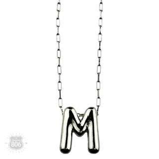 Silver letter pendant on necklace, initial monogram
