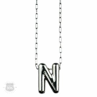 Silver letter pendant on necklace, initial monogram
