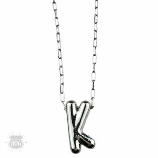 Silver letter pendant on necklace, initial monogram