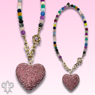 Rhinestone heart pendant on multi-color bead necklace