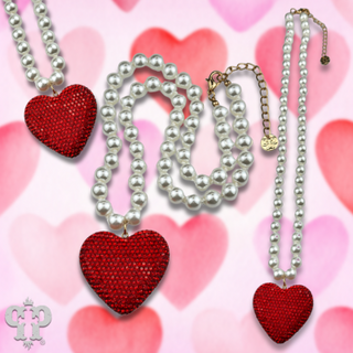 White pearl bead necklace with rhinestone heart pendant