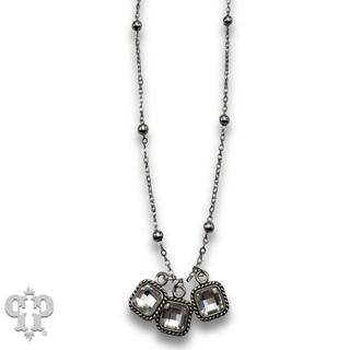 Fine chain and checkerboard cut rhinestone charm necklace