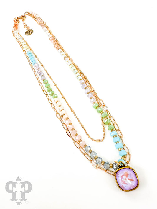 Triple strand necklace with Austrian crystal drop