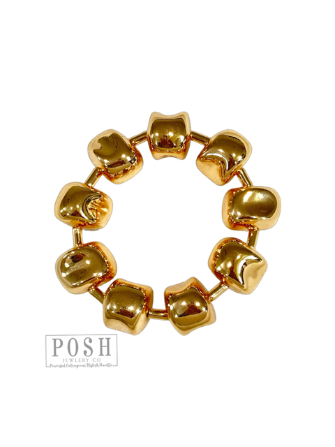 Gold tone sculptural bracelet