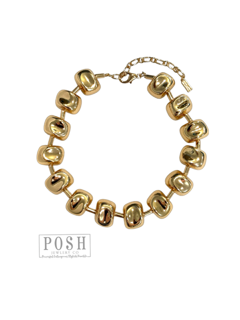 Gold tone sculptural choker