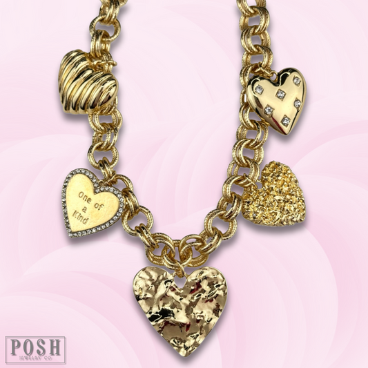 Gold heart charm necklace