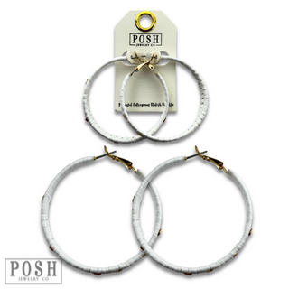 Woven gold flecked raffia hoop earring