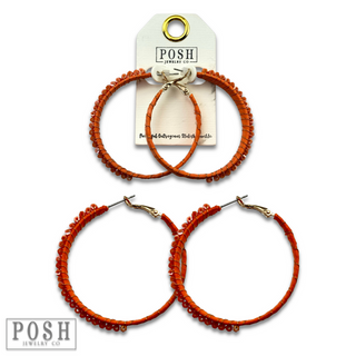 Hoop earring with wrapped crystal beads