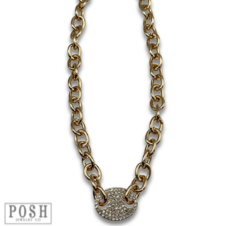 Gold chain link choker with pave oval charm