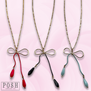 Whimsical bow pendant necklace
