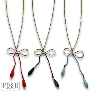 Whimsical bow pendant necklace