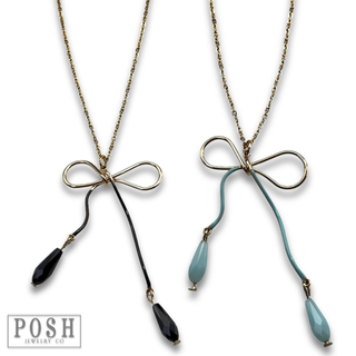 Whimsical bow pendant necklace