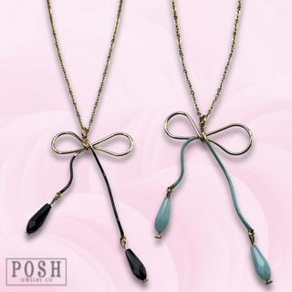 Whimsical bow pendant necklace