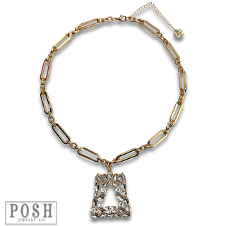 Shiny gold chain with rhinestone pendant