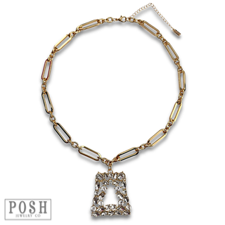 Shiny gold chain with rhinestone pendant