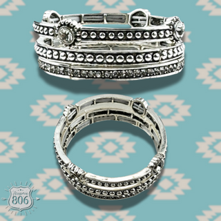 Three piece silver and rhinestone bracelet set