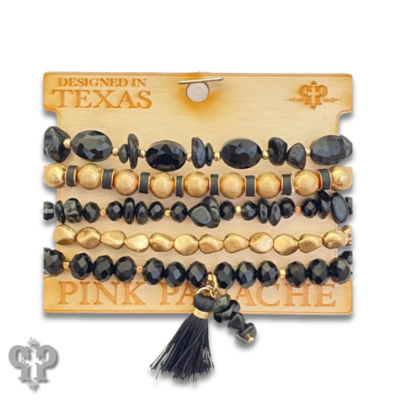 Black and brushed gold beaded bracelet stack