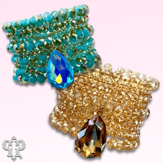 Faceted bead nine strand bracelet set, rhinestone teardrop charm
