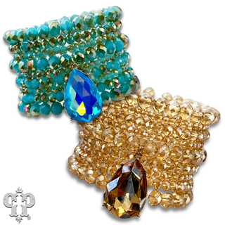 Faceted bead nine strand bracelet set, rhinestone teardrop charm