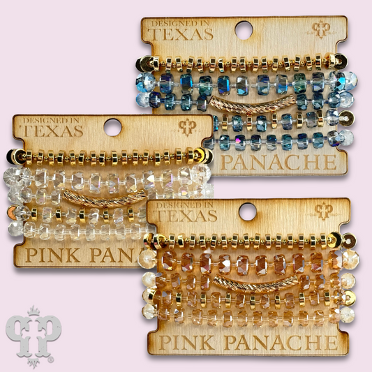 Faceted heishi bead bracelet with twisted tube bead feature