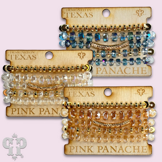 Faceted heishi bead bracelet with twisted tube bead feature