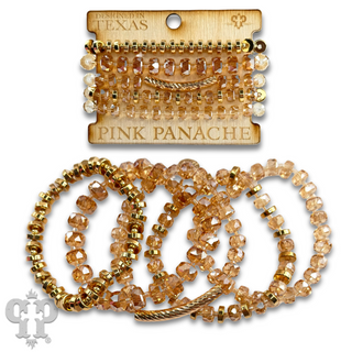 Faceted heishi bead bracelet with twisted tube bead feature