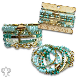 Mixed charm and bead multi strand bracelet