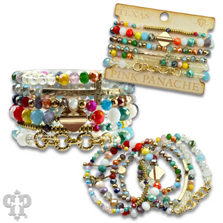 Mixed charm and bead multi strand bracelet