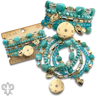 Mixed bead bracelet with charms