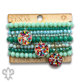 Turquoise color bead bracelet with seed bead charms
