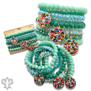Turquoise color bead bracelet with seed bead charms
