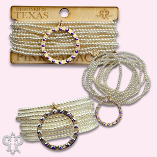 Multi-strand pearl stretch bracelet with charm
