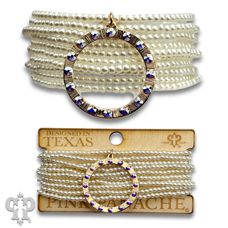 Multi-strand pearl stretch bracelet with charm