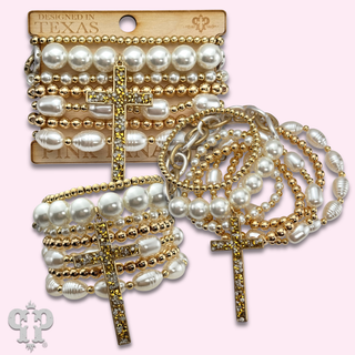 Multi-strand bead and chain bracelet with cross charm
