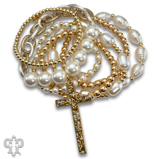 Multi-strand bead and chain bracelet with cross charm