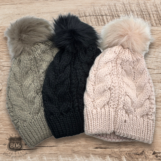 Cable knit pom-pom beanie