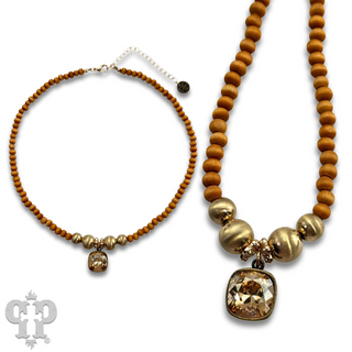 Round wood and brushed gold bead necklace with Austrian crystal