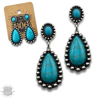 Stone teardrop in silver setting earring