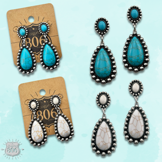Stone teardrop in silver setting earring