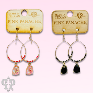 Rhinestone charm on beaded circle earring