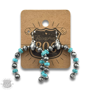 Turquoise, silver arched horn earring