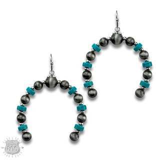 Turquoise, silver arched horn earring