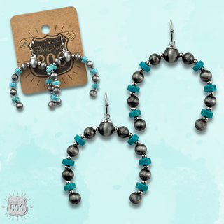 Turquoise, silver arched horn earring