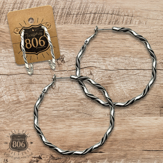 Silver texture wrapped hoop earring