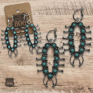 Squash blossom earring on hoops