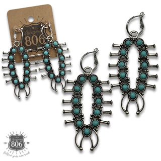 Squash blossom earring on hoops