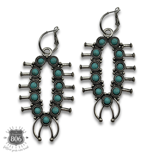 Squash blossom earring on hoops