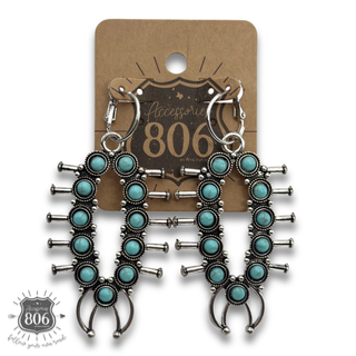 Squash blossom earring on hoops